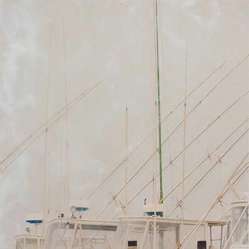 Marine vessel with masts and antennas against a white background
